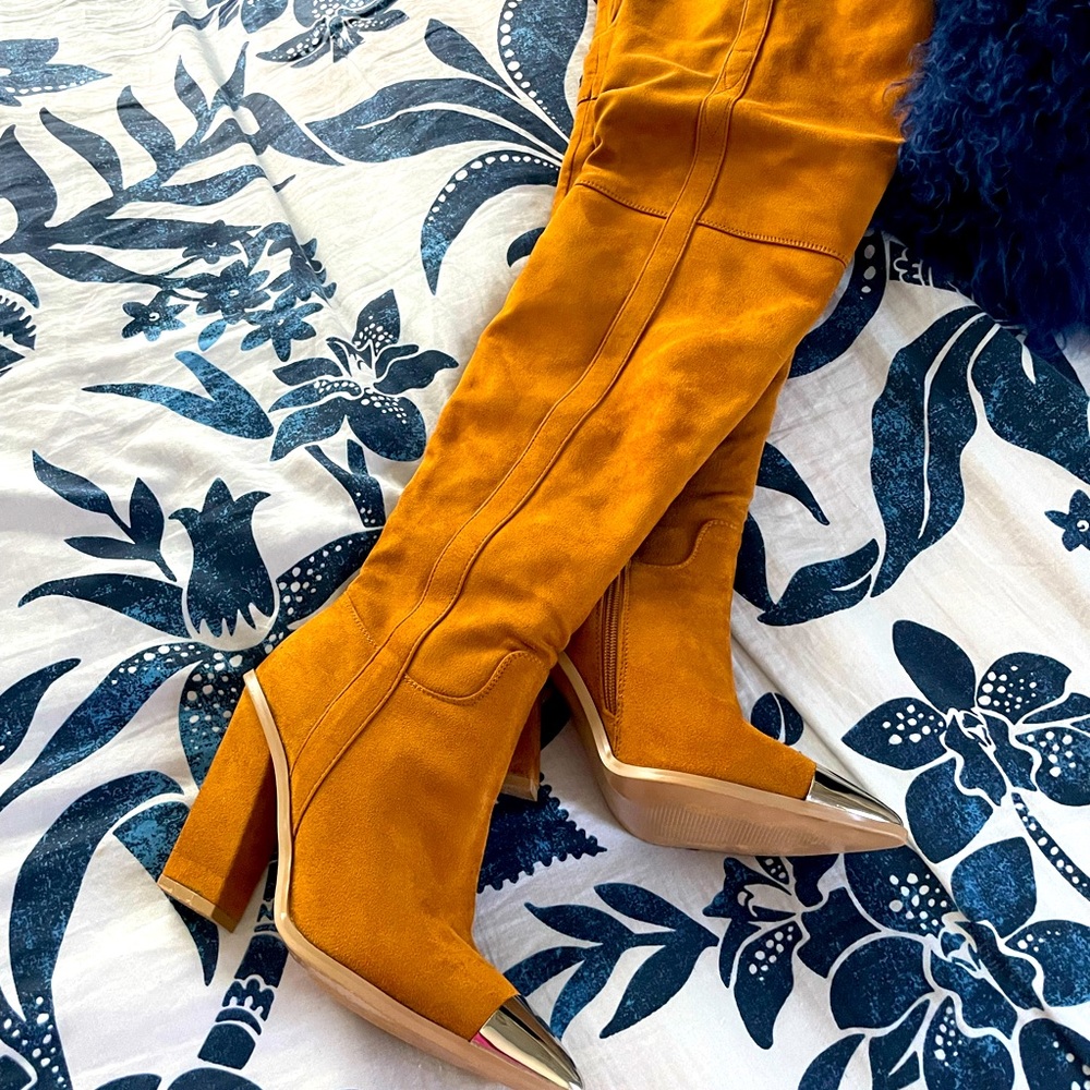 Suede thigh boots with gold chrome toe